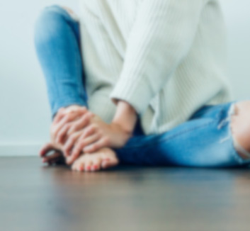 Stylized Photo of Woman Sitting Cross Legged